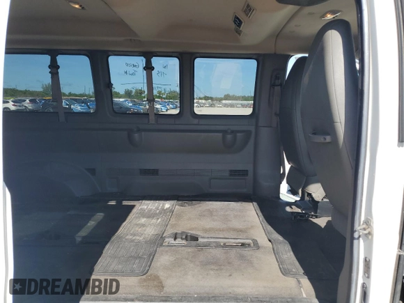 2012 Chevrolet Express Passenger 1LT z VIN 1GAZGYFG1C1154844, wystawiony jako Copart lot #64774005 z przebiegiem 181 261 mil mil oraz Szkoda całkowita • Salvage title. Historia ofert i sprzedaży dostępna na DreamBid. Obrazek 11.