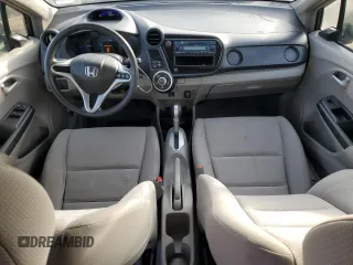 2012 Honda Insight z VIN JHMZE2H32CS000284, wystawiony jako Copart lot #50160335 z przebiegiem 64 074 mil mil oraz Szkoda całkowita • Salvage title. Historia ofert i sprzedaży dostępna na DreamBid. Obrazek 8.