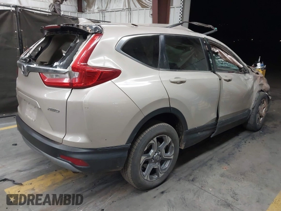 2018 Honda CR-V EX-L z VIN 2HKRW2H89JH671327, wystawiony jako IAAI lot #42159441 z przebiegiem Nie podano mil oraz . Historia ofert i sprzedaży dostępna na DreamBid. Obrazek 4.