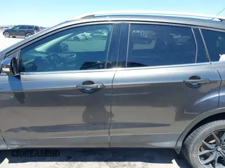 2017 Ford Escape Titanium with VIN 1FMCU0J97HUE07747, listed as a IAAI auction lot 41977788 with 104,560 mi miles. Bid and sale history available at carsss.com. Image 14.