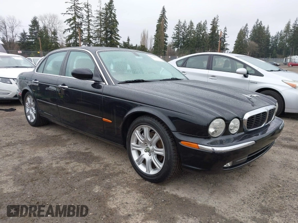 2004 Jaguar XJ with VIN SAJWA71C94SG29019, listed as a IAAI auction lot 41664978 with 133,546 mi miles. Bid and sale history available at carsss.com. Image 1.