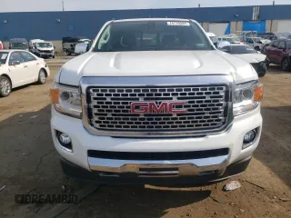 2020 GMC Canyon 4WD Denali with VIN 1GTG6EEN1L1232751, listed as a Copart auction lot 74719334 with 115,105 mi miles and Salvage Title. Bid and sale history available at carsss.com. Image 5.