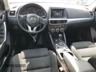 2016 Mazda CX-5 Touring with VIN JM3KE2CY8G0902131, listed as a Copart auction lot 53354745 with 123,474 mi miles and Salvage Title. Bid and sale history available at carsss.com. Image 8.