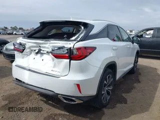 2017 Lexus RX with VIN JTJBZMCA1H2015937, listed as a IAAI auction lot 41735167 with 47,410 mi miles. Bid and sale history available at carsss.com. Image 4.