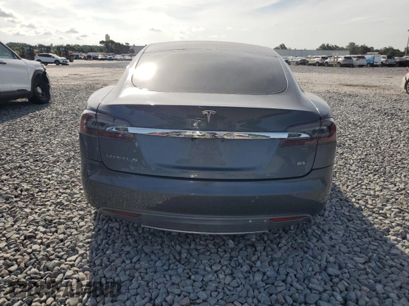 2014 Tesla Model S 60 with VIN 5YJSA1H1XEFP32590, listed as a Copart auction lot 64424145 with Not provided miles and Clean title. Bid and sale history available at DreamBid. Image 6.