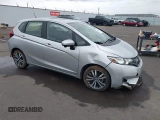 2016 Honda Fit EX z VIN JHMGK5H70GX046385, wystawiony jako IAAI lot #42014521 z przebiegiem 16 636 mil mil oraz . Historia ofert i sprzedaży dostępna na DreamBid. Obrazek 1.