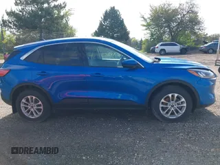 2021 Ford Escape SE Hybrid z VIN 1FMCU9BZ7MUA06972, wystawiony jako IAAI lot #42376836 z przebiegiem 57 372 mil mil oraz . Historia ofert i sprzedaży dostępna na DreamBid. Obrazek 13.