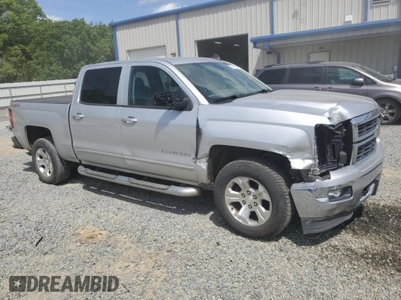 2015 Chevrolet Silverado 1500 LT with VIN 3GCUKREC4FG235301, listed as a Copart auction lot 51747915 with 179,033 mi miles and Salvage Title. Bid and sale history available at DreamBid. Image 4.