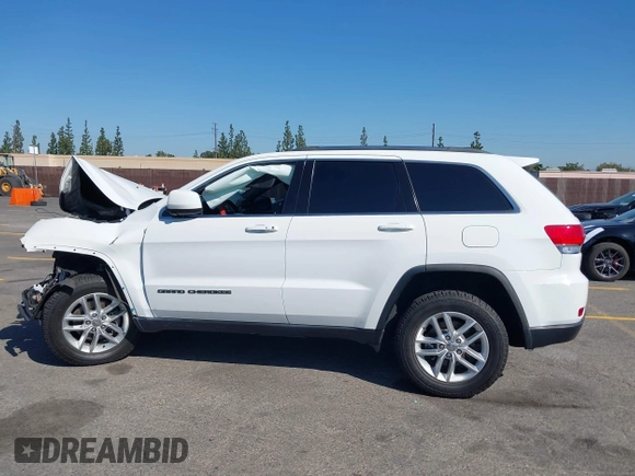 2018 Jeep Grand Cherokee Laredo E with VIN 1C4RJEAGXJC260645, listed as a IAAI auction lot 42002545 with Not provided miles and . Bid and sale history available at DreamBid. Image 14.