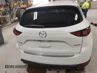 2020 Mazda CX-5 Grand Touring with VIN JM3KFBDM6L1828611, listed as a IAAI auction lot 42006976 with 59,939 mi miles and . Bid and sale history available at DreamBid. Image 17.