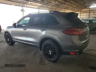 2012 Porsche Cayenne S Hybrid z VIN WP1AE2A27CLA92565, wystawiony jako Copart lot #82221214 z przebiegiem 130 210 mil mil oraz Szkody całkowita. Historia ofert i sprzedaży dostępna na DreamBid. Obrazek 2.