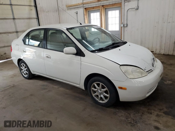 2003 Toyota Prius z VIN JT2BK18U530079842, wystawiony jako Copart lot #52776915 z przebiegiem 223 077 mil mil oraz Szkoda całkowita • Salvage title. Historia ofert i sprzedaży dostępna na DreamBid. Obrazek 4.