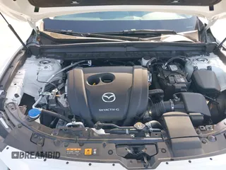 2024 Mazda CX-50 S Select with VIN 7MMVABAM2RN242725, listed as a IAAI auction lot 41477519 with 4,808 mi miles and . Bid and sale history available at DreamBid. Image 10.