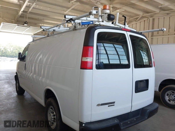 2015 Chevrolet Express Cargo with VIN 1GCWGFCF9F1277631, listed as a IAAI auction lot 42528992 with 243,209 mi miles and . Bid and sale history available at DreamBid. Image 3.