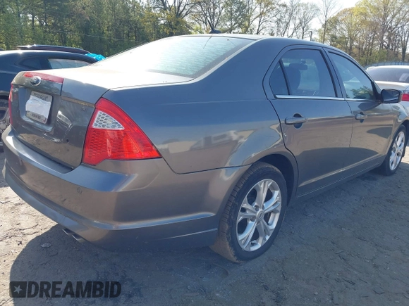 2012 Ford Fusion SE z VIN 3FAHP0HA4CR306608, wystawiony jako IAAI lot #41939924 z przebiegiem 176 689 mil mil oraz . Historia ofert i sprzedaży dostępna na DreamBid. Obrazek 4.