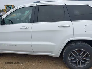 2014 Jeep Grand Cherokee Overland with VIN 1C4RJECG4EC543092, listed as a IAAI auction lot 40981315 with 149,096 mi miles. Bid and sale history available at carsss.com. Image 15.