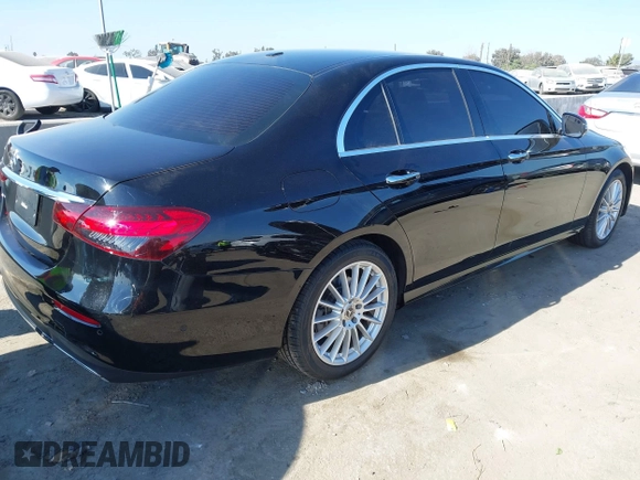 2021 Mercedes-Benz E-Class E 350 with VIN W1KZF8DB0MA889890, listed as a IAAI auction lot 41317094 with 63,075 mi miles. Bid and sale history available at carsss.com. Image 4.