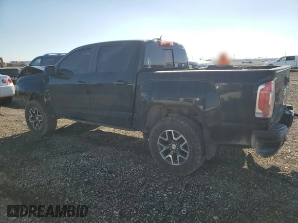 2021 GMC Canyon 4WD AT4 w/Leather with VIN 1GTG6FEN3M1274409, listed as a Copart auction lot 42502355 with 57,194 mi miles and Salvage Title. Bid and sale history available at carsss.com. Image 2.