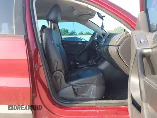 2011 Volkswagen Tiguan SEL w/Premium Navi with VIN WVGAV7AX4BW001402, listed as a IAAI auction lot 42406619 with 183,035 mi miles and . Bid and sale history available at DreamBid. Image 5.