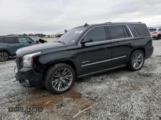 2016 GMC Yukon Denali with VIN 1GKS1CKJ8GR310002, listed as a Copart auction lot 41508865 with 161,949 mi miles and Salvage Title. Bid and sale history available at carsss.com. Image 1.