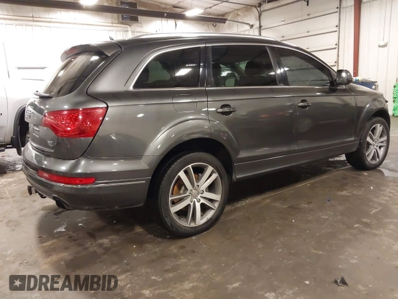 2015 Audi Q7 Premium Plus z VIN WA1LGAFE1FD023297, wystawiony jako IAAI lot #42128488 z przebiegiem 173 407 mil mil oraz . Historia ofert i sprzedaży dostępna na DreamBid. Obrazek 4.