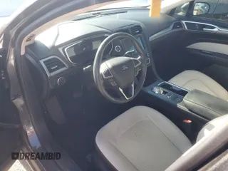 2020 Ford Fusion SE z VIN 3FA6P0HD6LR189762, wystawiony jako IAAI lot #42780149 z przebiegiem 51 099 mil mil oraz . Historia ofert i sprzedaży dostępna na DreamBid. Obrazek 7.