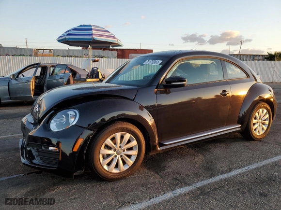2019 Volkswagen Beetle S with VIN 3VWFD7AT3KM710863, listed as a Copart auction lot 79176004 with 0 mi miles and Salvage Title. Bid and sale history available at carsss.com. Image 1.