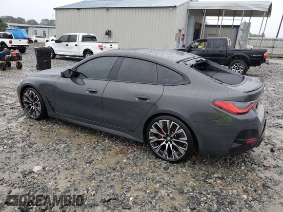 2023 BMW 4 Series M440i with VIN WBA63AW06PFN54632, listed as a Copart auction lot 70994044 with 11,718 mi miles and Salvage title. Bid and sale history available at DreamBid. Image 2.