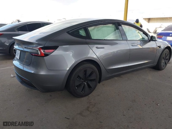 2025 Tesla Model 3 Long Range with VIN 5YJ3E1EBXSF912475, listed as a IAAI auction lot 41449488 with 3,100 mi miles. Bid and sale history available at carsss.com. Image 4.