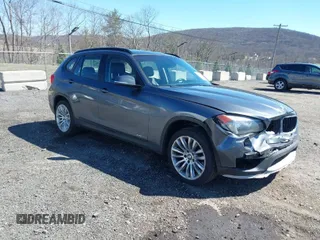 2015 BMW X1 xDrive28i with VIN WBAVL1C59FVY25442, listed as a IAAI auction lot 41854794 with 98,432 mi miles. Bid and sale history available at carsss.com. Image 1.