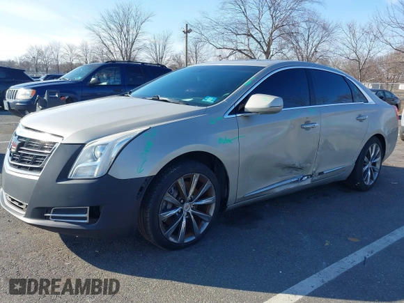 2013 Cadillac XTS Luxury z VIN 2G61R5S31D9185009, wystawiony jako IAAI lot #41243001 z przebiegiem 161 219 mil mil oraz . Historia ofert i sprzedaży dostępna na DreamBid. Obrazek 6.