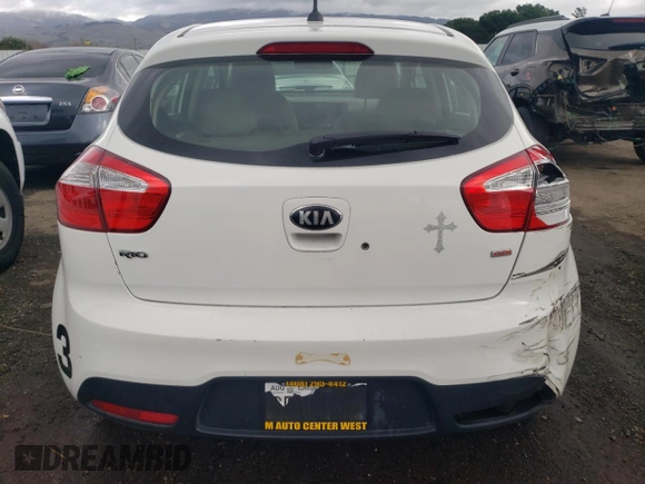 2014 Kia Rio LX with VIN KNADM5A34E6377346, listed as a Copart auction lot 82783993 with 107,160 mi miles and Salvage Title. Bid and sale history available at carsss.com. Image 6.