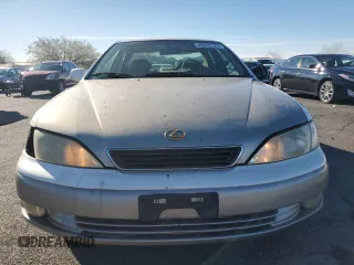 1999 Lexus ES 300 z VIN JT8BF28G4X5060914, wystawiony jako Copart lot #45912725 z przebiegiem 197 401 mil mil oraz Szkoda całkowita • Salvage title. Historia ofert i sprzedaży dostępna na DreamBid. Obrazek 5.