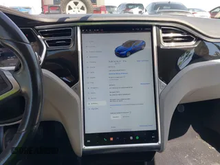 2013 Tesla Model S with VIN 5YJSA1CNXDFP06077, listed as a IAAI auction lot 41958105 with 84,773 mi miles. Bid and sale history available at carsss.com. Image 18.