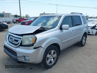 2011 Honda Pilot EX-L with VIN 5FNYF4H54BB099550, listed as a IAAI auction lot 42107327 with 217,050 mi miles and . Bid and sale history available at carsss.com. Image 17.