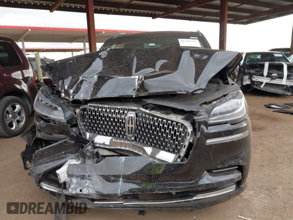 2024 Lincoln Aviator Reserve z VIN 5LM5J7WC2RGL05445, wystawiony jako IAAI lot #42184539 z przebiegiem 68 616 mil mil oraz . Historia ofert i sprzedaży dostępna na DreamBid. Obrazek 6.