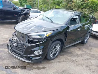 2021 Hyundai Tucson Ultimate with VIN KM8J3CAL2MU320419, listed as a IAAI auction lot 42116859 with 34,172 mi miles and . Bid and sale history available at DreamBid. Image 2.