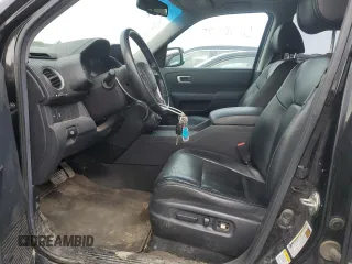 2013 Honda Pilot Touring z VIN 5FNYF4H97DB007336, wystawiony jako Copart lot #52785595 z przebiegiem 141 104 mil mil oraz Szkoda całkowita • Salvage title. Historia ofert i sprzedaży dostępna na DreamBid. Obrazek 7.