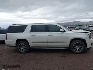 2015 GMC Yukon XL Denali with VIN 1GKS2JKJ2FR590502, listed as a IAAI auction lot 41758575 with 129,777 mi miles. Bid and sale history available at carsss.com. Image 12.