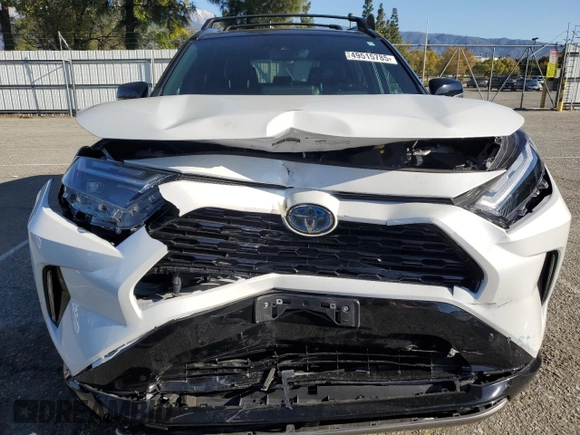 2024 Toyota RAV4 Hybrid XSE with VIN 2T3E6RFV4RW060903, listed as a Copart auction lot 49515785 with 8,637 mi miles and Salvage Title. Bid and sale history available at DreamBid. Image 5.
