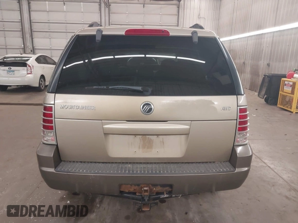2003 Mercury Mountaineer Convenience z VIN 4M2ZU86K23ZJ06043, wystawiony jako IAAI lot #42215814 z przebiegiem 259 172 mil mil oraz . Historia ofert i sprzedaży dostępna na DreamBid. Obrazek 17.