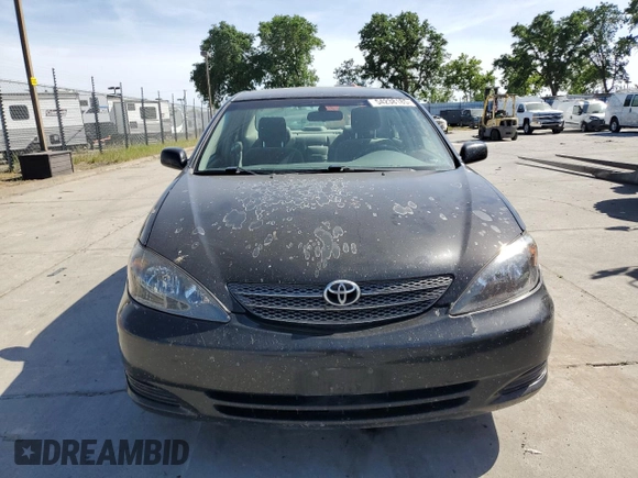 2004 Toyota Camry LE with VIN 4T1BE32K14U318133, listed as a Copart auction lot 54238185 with 293,761 mi miles and Salvage Title. Bid and sale history available at carsss.com. Image 5.