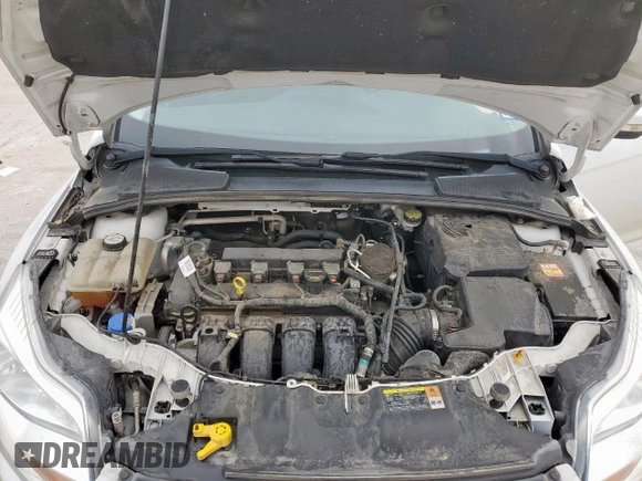 2013 Ford Focus SE z VIN 1FADP3F23DL108047, wystawiony jako Copart lot #57450795 z przebiegiem 67 518 mil mil oraz Szkoda całkowita • Salvage title. Historia ofert i sprzedaży dostępna na DreamBid. Obrazek 11.