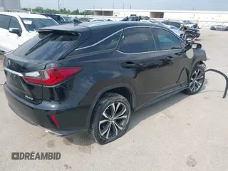 2018 Lexus RX 350 with VIN 2T2ZZMCA1JC103035, listed as a IAAI auction lot 42241695 with 104,382 mi miles and . Bid and sale history available at DreamBid. Image 4.