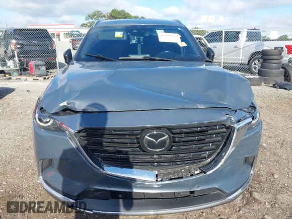 2021 Mazda CX-9 Grand Touring with VIN JM3TCADY7M0528223, listed as a IAAI auction lot 42395861 with 57,767 mi miles and . Bid and sale history available at DreamBid. Image 6.