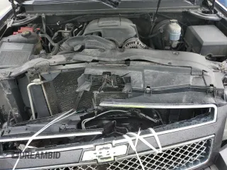 2011 Chevrolet Suburban LT with VIN 1GNSKJE3XBR259726, listed as a Copart auction lot 66365284 with 210,577 mi miles and Salvage Title. Bid and sale history available at carsss.com. Image 12.