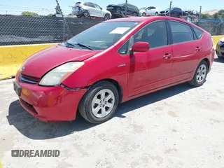 2007 Toyota Prius z VIN JTDKB20U477616450, wystawiony jako IAAI lot #42304173 z przebiegiem 258 469 mil mil oraz . Historia ofert i sprzedaży dostępna na DreamBid. Obrazek 2.