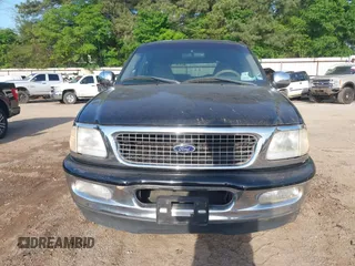 1998 Ford Expedition XLT with VIN 1FMRU1766WLC31063, listed as a IAAI auction lot 41959189 with 168,690 mi miles. Bid and sale history available at carsss.com. Image 6.