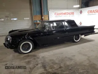 1960 Ford Thunderbird with VIN 0Y71Y188635, listed as a Copart auction lot 49905725 with 1,414 mi miles and Salvage Title. Bid and sale history available at DreamBid. Image 1.