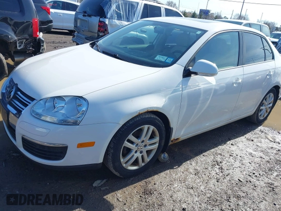 2010 Volkswagen Jetta Sedan Limited with VIN 3VWRZ7AJ1AM148618, listed as a IAAI auction lot 41812669 with 129,657 mi miles. Bid and sale history available at carsss.com. Image 2.